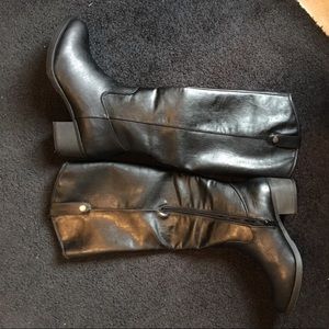 Tall black riding boot